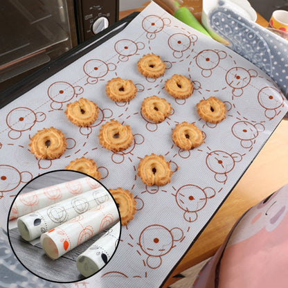 White macaron baking mat with red line circle pattern and macaron molds