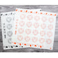 White baking sheets with orange circle baking guide pattern and small icon panel