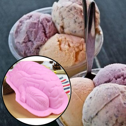 Pink silicone brain-shaped baking mold with detailed cerebrum texture.