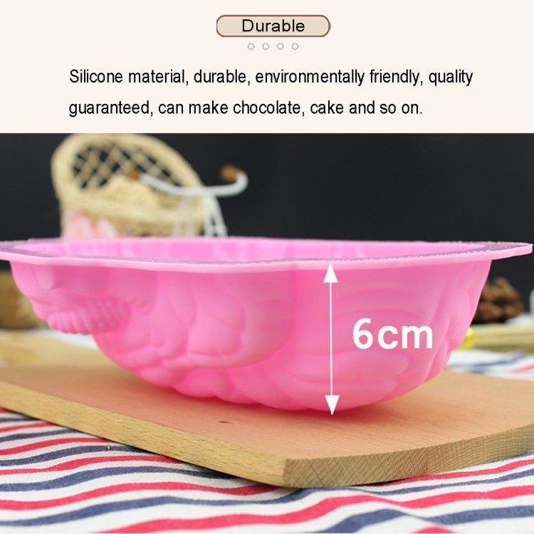Pink silicone brain-shaped mold with detailed texture in a side view.