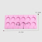 Pink silicone lollipop chocolate mold tray showing cavity layout and size measurements