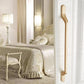 Gold cabinet door pull handle, long curved bar with rounded ends and mounting base