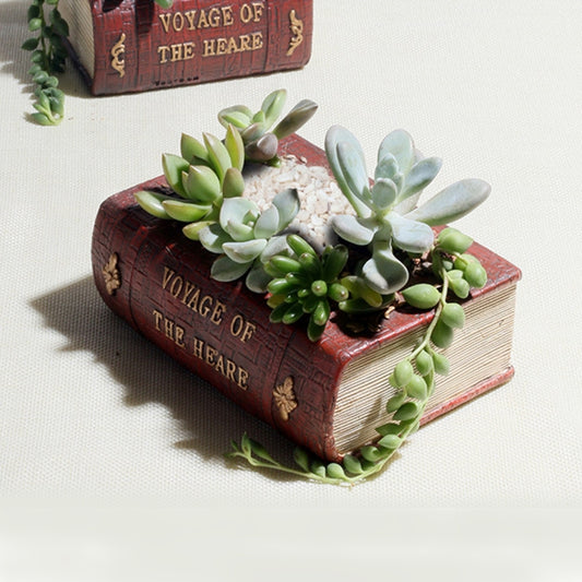 Retro book-style planter with succulents, red-brown sides and spine print