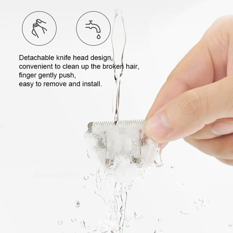 Detachable electric pet clipper blade head rinsed under water