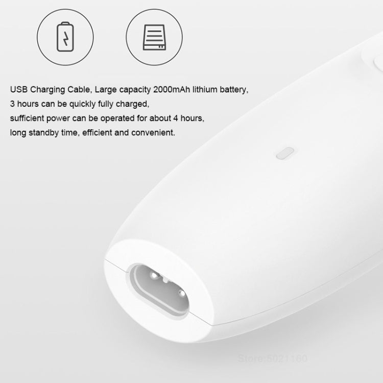 White electric pet clipper with USB charging port and power button