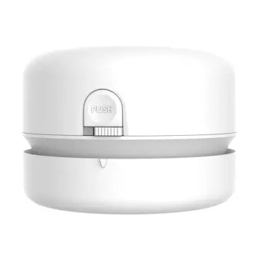 White compact desktop cleaner with push button on the top panel