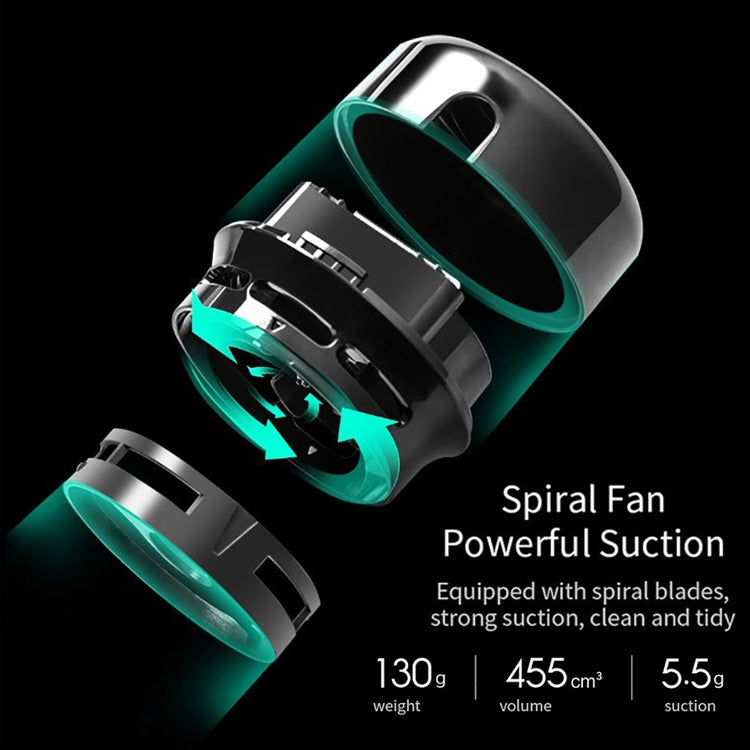 Mini desktop vacuum cleaner showing internal spiral fan and airflow