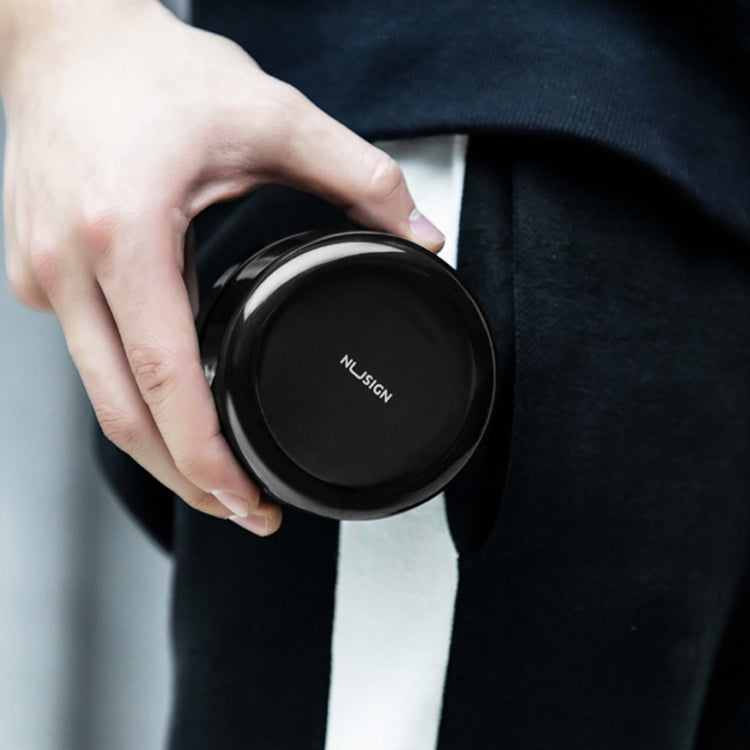 Mini desktop vacuum cleaner held in hand, round black top with NUSIGN logo
