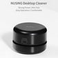 Black round mini desktop cleaner with front power switch cover on the base