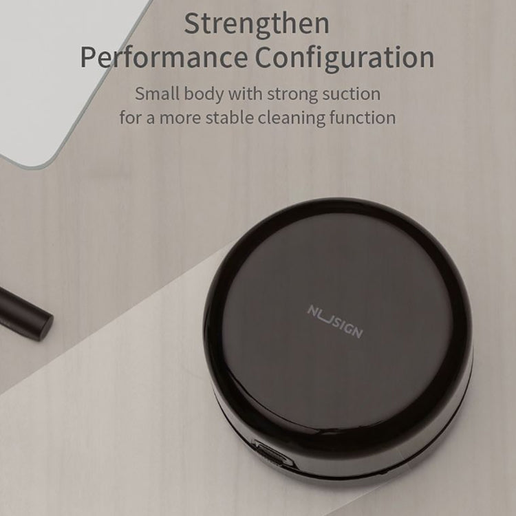 Black round desktop cleaner with smooth top and brand logo
