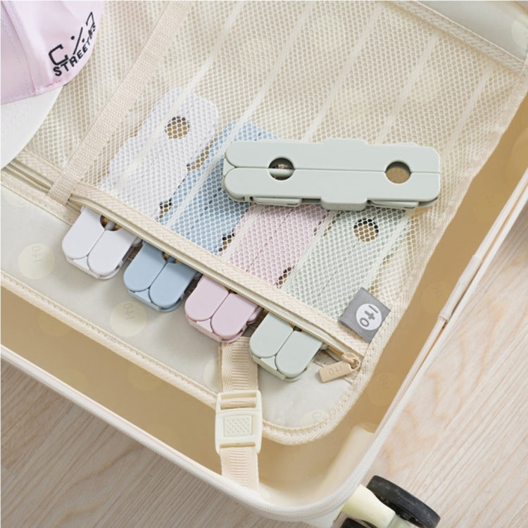 Foldable clothes drying hanger rack clips holding small garments in a mesh organizer