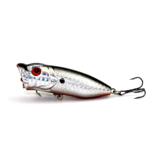 Silver popper fishing lure with red eye and treble hooks