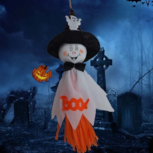 Hanging Halloween ghost decoration with black witch hat, white body, and orange skirt