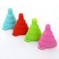 Mini silicone foldable funnels in blue, red, green, and pink