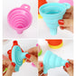 Pink and blue foldable silicone funnels with hands adjusting the spouts