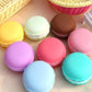 Pastel macaron-style storage boxes arranged together on a flat surface