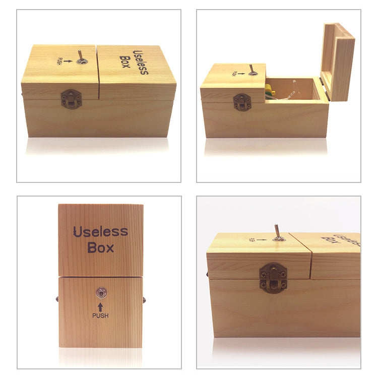 Wooden useless box shown open, revealing interior with push-button panel