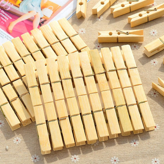 Pack of bamboo peg clips laid in rows, each with a metal spring clamp
