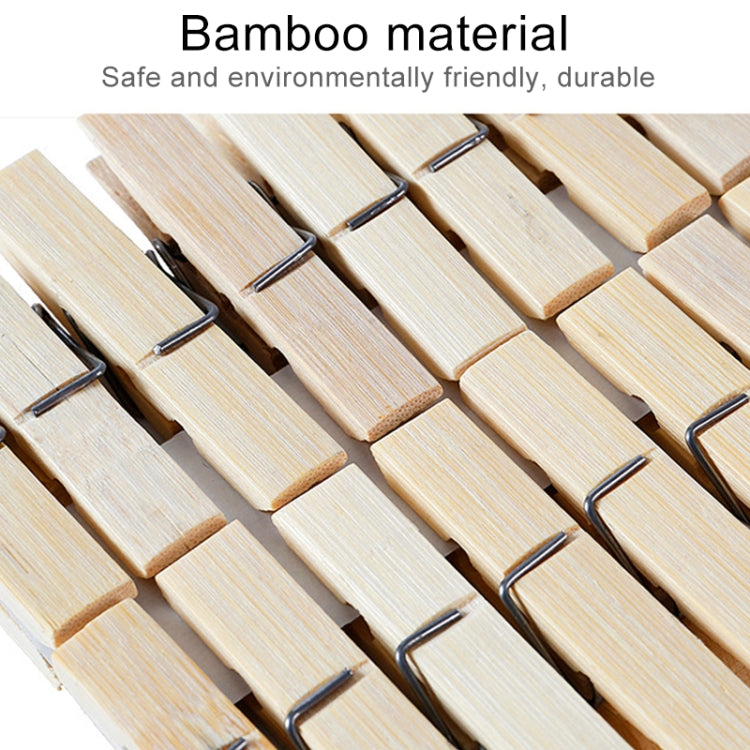 Close-up of bamboo peg clips with metal spring clamps along the wooden slats
