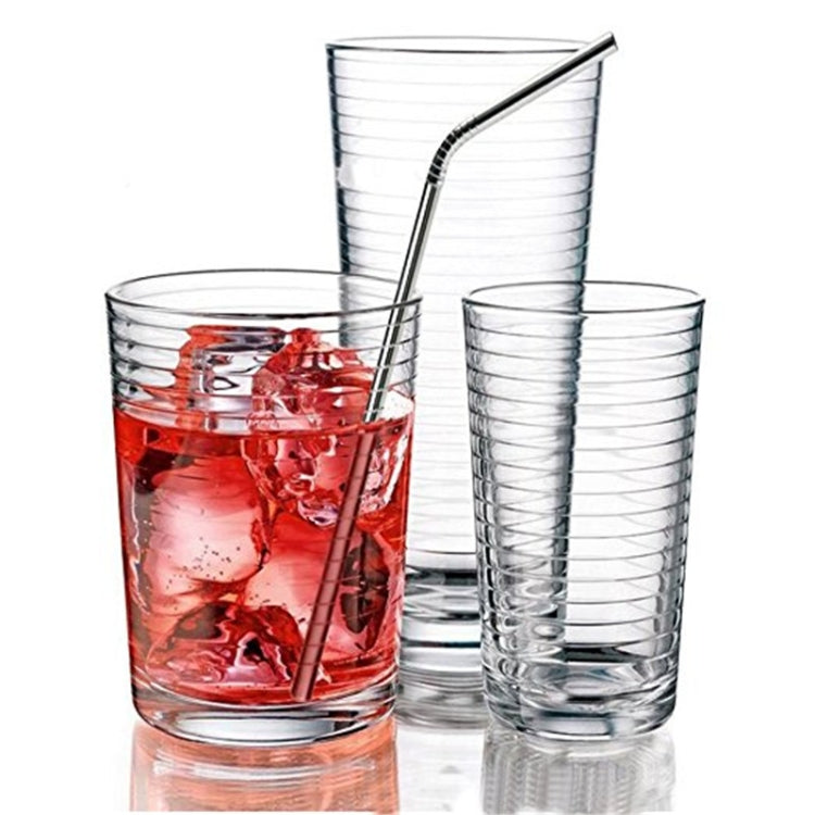 Reusable stainless steel drinking straws in clear cups with ice and drinks