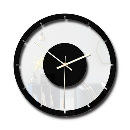Round wall clock with black rim, clear acrylic face, black center disc, gold hands