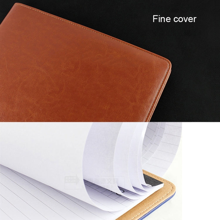 Light brown leather document folder with pen loop and fine cover texture