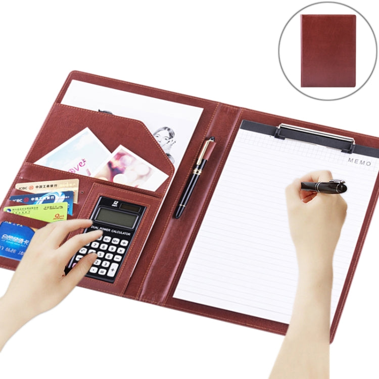 Red leather document folder with calculator and notepad pages open, pen and memo visible