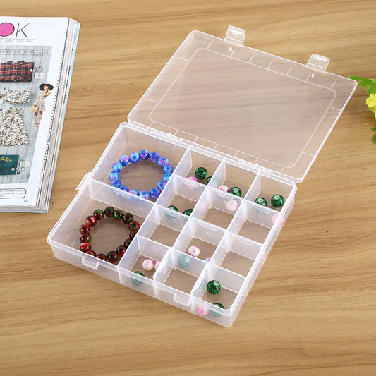 Clear organizer box with open lid and 14 small compartments for jewelry and beads