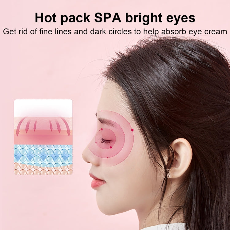 Pink hot eye pack style mask on model’s face with gray strap and padded eye cover