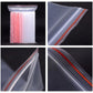 Closeup clear zip lock packaging bags showing sealed rim and seam lines