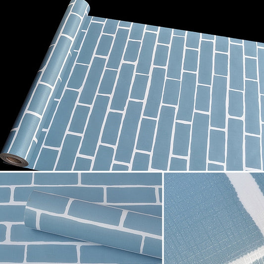 Light blue brick wallpaper roll showing textured pattern and edge seam