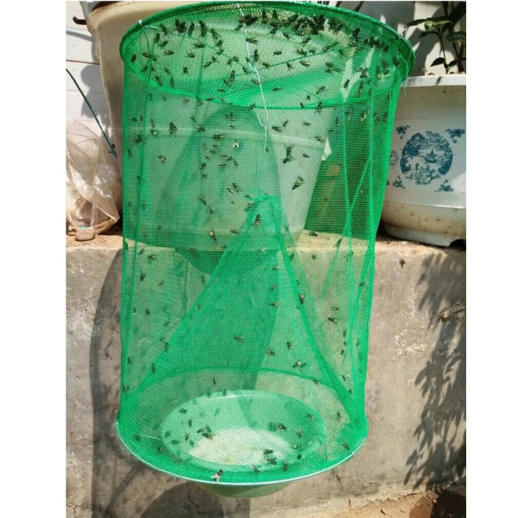 Green mesh hanging fly cage with insects trapped inside at the bottom