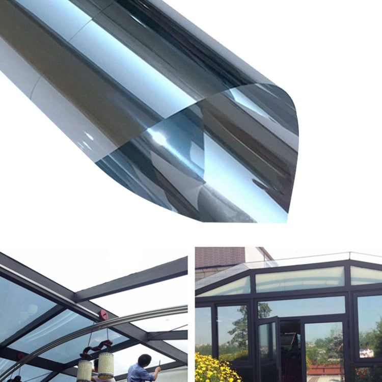 Silver reflective privacy glass film on sunroom roof and side panels