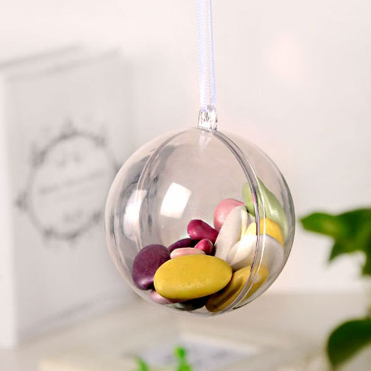 Hanging clear hollow plastic sphere ornament with multicolor dried flowers inside