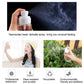Hand holding a transparent spray bottle with white fine-mist pump head