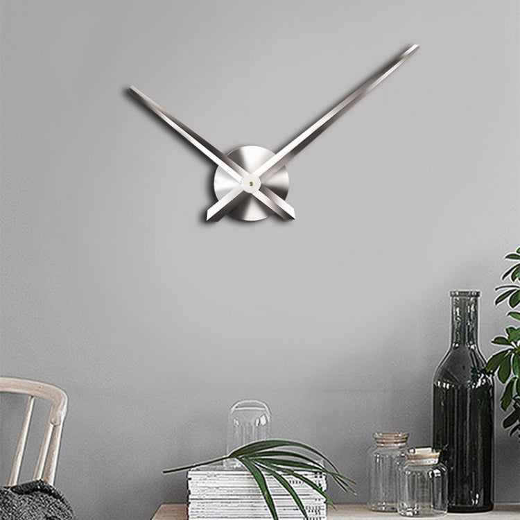 Silver stainless steel wall clock with three-blade center and long hour and minute hands