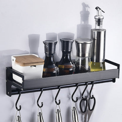 Black wall hanging kitchen storage rack with top shelf and six curved hooks