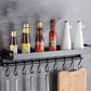 Black wall hanging rack with 10 curved hooks, top shelf, and wooden cutting board
