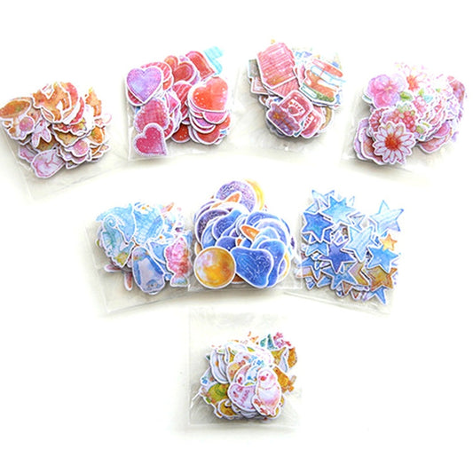 Assorted pastel PVC stickers with hearts, flowers, and stars in small clusters