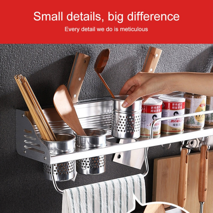 Aluminum wall condiment rack with stainless cups and upright utensil slots