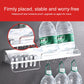 Aluminum wall rack with hanging hooks under front rail, holding cups and bottles
