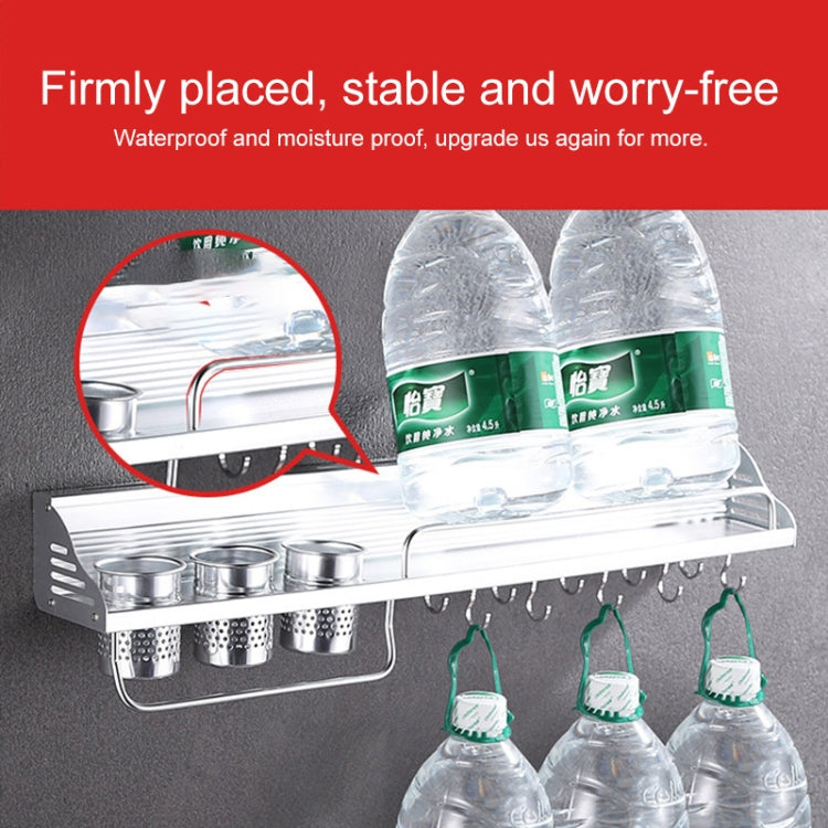 Aluminum wall rack with hanging hooks under front rail, holding cups and bottles