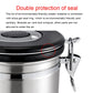 Black and silver stainless steel storage container with seal ring around lid