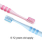 Set of two kids toothbrushes: pink and blue, soft bristles with striped grips