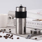 Stainless steel manual coffee grinder with crank handle and black grip band