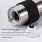 Manual grinder showing ceramic conical grinding core and white base ring
