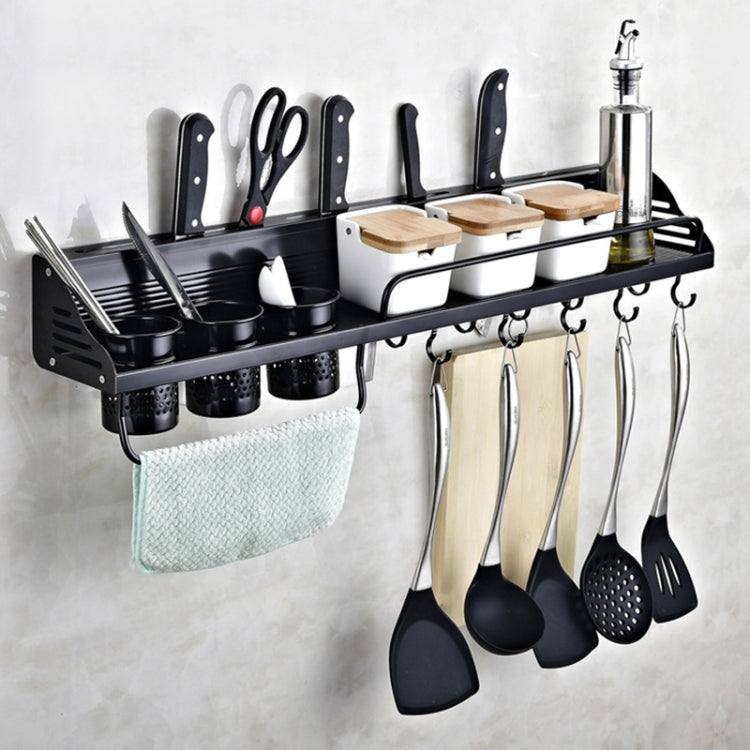 Black wall-mounted kitchen storage rack with 10 hooks, cups, and wooden board toppers