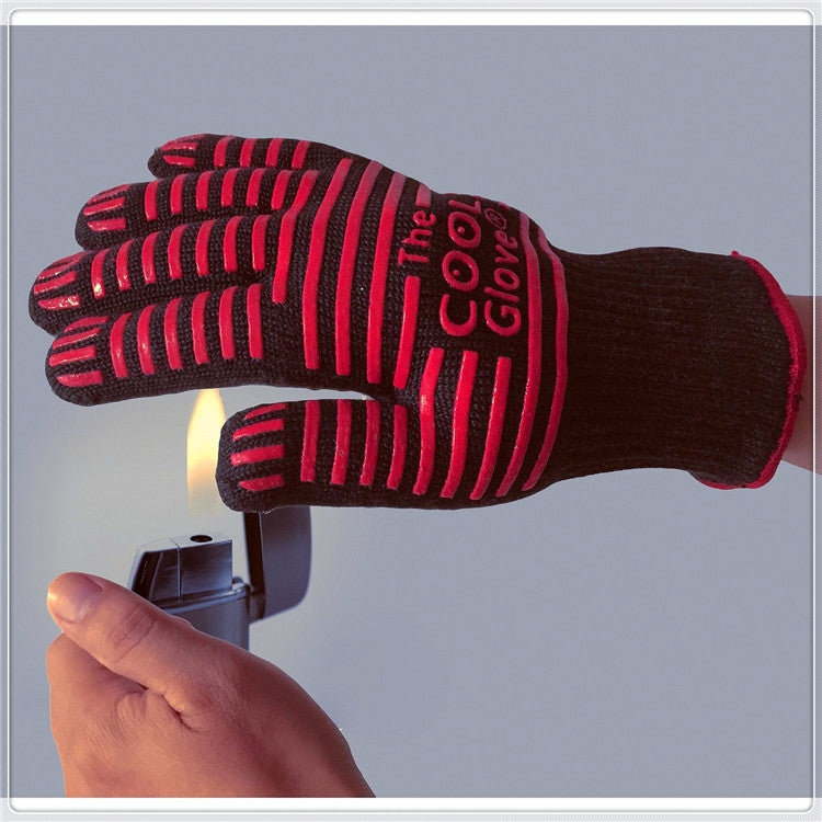 Heat-resistant BBQ glove close-up with red striped palm grips and black cuff