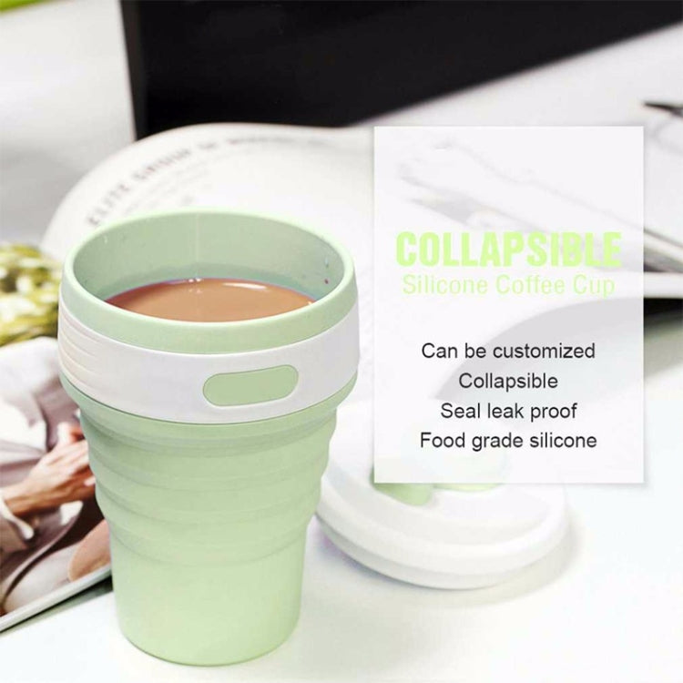 Light green folding silicone coffee cup with snap lid and ribbed grip, 350ml