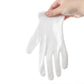 White cotton working glove held by hand, thick cuff and fingered design